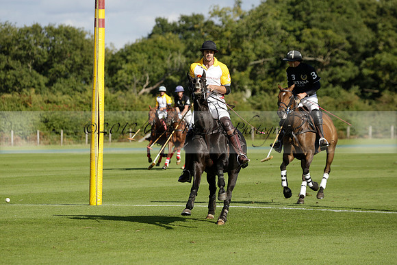 Aryana (black) v Shoreline (yellow) in a Farewell Cup polo match played on Ambersham 5 at Cowdray Park Polo Club on Wednesday 18 September 2013. www.polopictures.co.uk