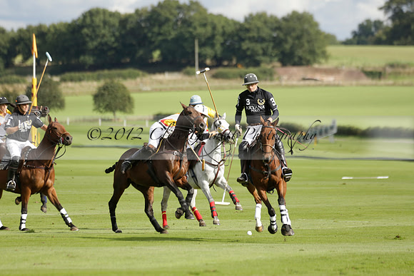 Aryana (black) v Shoreline (yellow) in a Farewell Cup polo match played on Ambersham 5 at Cowdray Park Polo Club on Wednesday 18 September 2013. www.polopictures.co.uk
