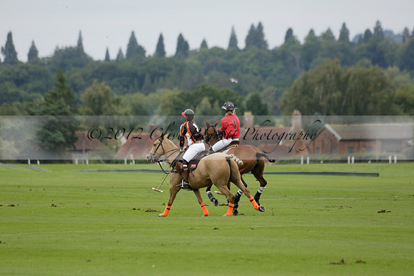 Four Quarters Black (black) v Clashleigh (red) in the Autumn Cup subsidiary final polo match on Ambersham 2 at Cowdray Park Polo Club on Sunday 22 September 2013 www.polopictures.co.uk