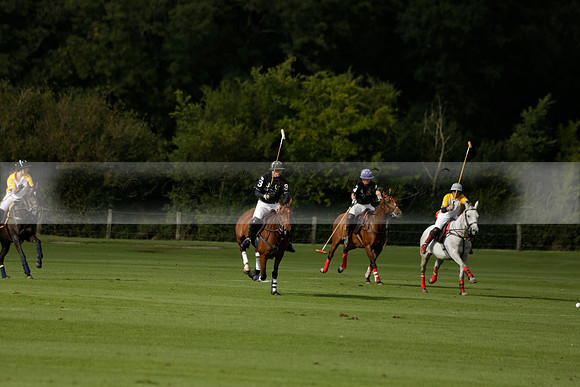 Aryana (black) v Shoreline (yellow) in a Farewell Cup polo match played on Ambersham 5 at Cowdray Park Polo Club on Wednesday 18 September 2013. www.polopictures.co.uk