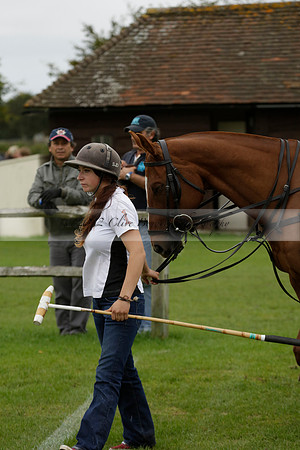 Four Quarters Black (black) v Clashleigh (red) in the Autumn Cup subsidiary final polo match on Ambersham 2 at Cowdray Park Polo Club on Sunday 22 September 2013 www.polopictures.co.uk