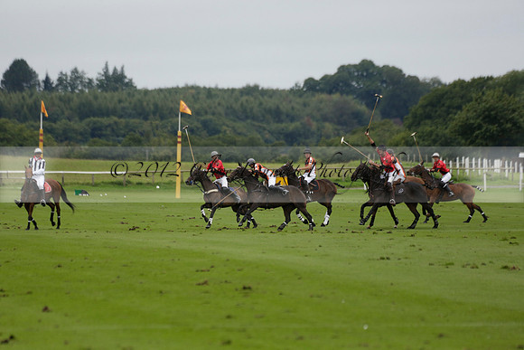 Four Quarters Black (black) v Clashleigh (red) in the Autumn Cup subsidiary final polo match on Ambersham 2 at Cowdray Park Polo Club on Sunday 22 September 2013 www.polopictures.co.uk