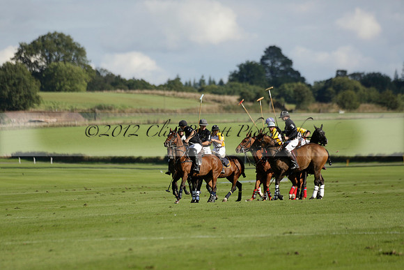 Aryana (black) v Shoreline (yellow) in a Farewell Cup polo match played on Ambersham 5 at Cowdray Park Polo Club on Wednesday 18 September 2013. www.polopictures.co.uk