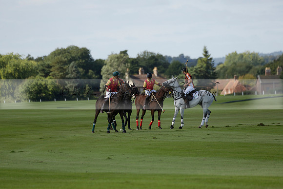 Four Quarters Black (black) v BHC (red) in a Autumn Cup polo match on Ambersham 2 at Cowdray Park Polo Club on Friday 20 September 2013 www.polopictures.co.uk