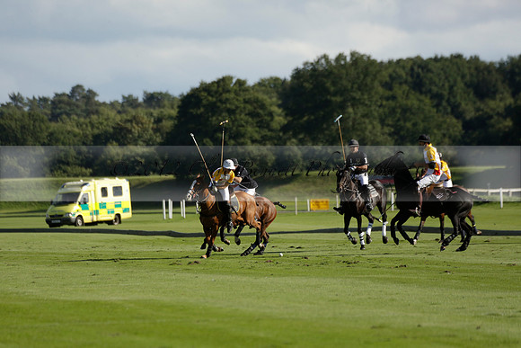 Aryana (black) v Shoreline (yellow) in a Farewell Cup polo match played on Ambersham 5 at Cowdray Park Polo Club on Wednesday 18 September 2013. www.polopictures.co.uk