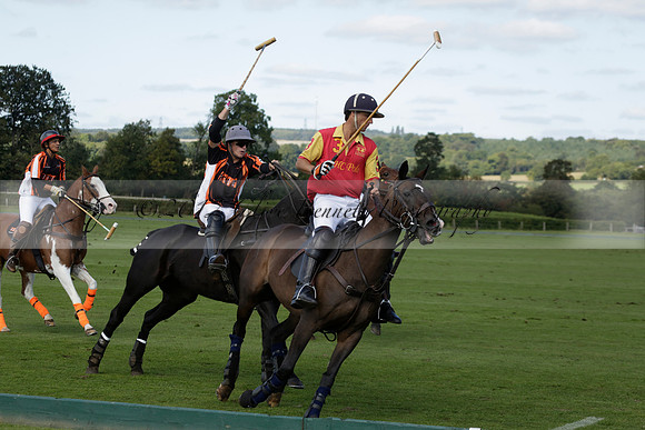 Four Quarters Black (black) v BHC (red) in a Autumn Cup polo match on Ambersham 2 at Cowdray Park Polo Club on Friday 20 September 2013 www.polopictures.co.uk