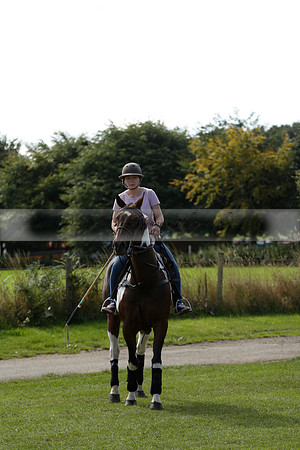 Four Quarters Black (black) v BHC (red) in a Autumn Cup polo match on Ambersham 2 at Cowdray Park Polo Club on Friday 20 September 2013 www.polopictures.co.uk
