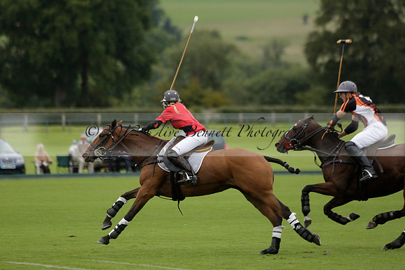 Four Quarters Black (black) v Clashleigh (red) in the Autumn Cup subsidiary final polo match on Ambersham 2 at Cowdray Park Polo Club on Sunday 22 September 2013 www.polopictures.co.uk