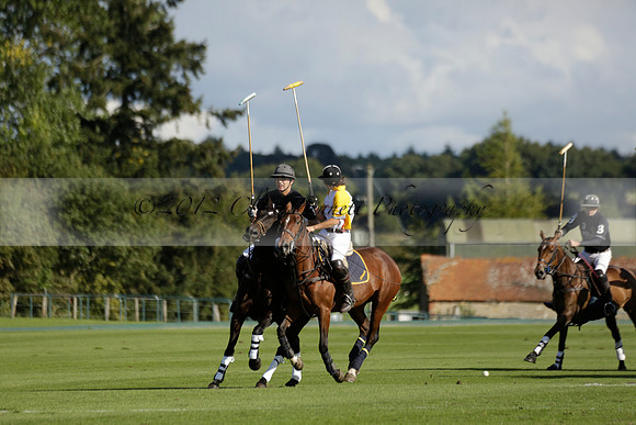 Aryana (black) v Shoreline (yellow) in a Farewell Cup polo match played on Ambersham 5 at Cowdray Park Polo Club on Wednesday 18 September 2013. www.polopictures.co.uk
