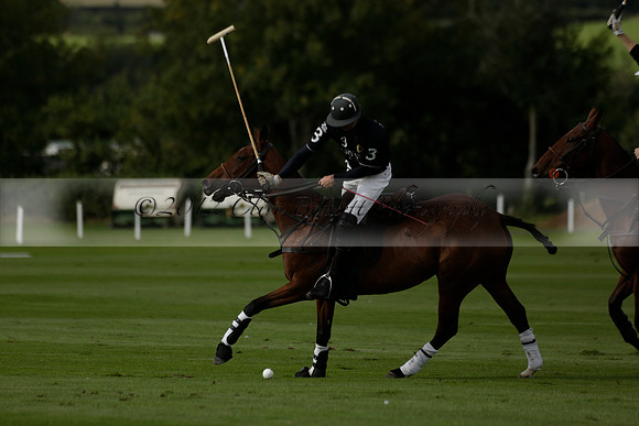 Aryana (black) v Shoreline (yellow) in a Farewell Cup polo match played on Ambersham 5 at Cowdray Park Polo Club on Wednesday 18 September 2013. www.polopictures.co.uk