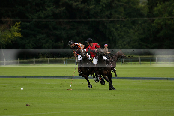 Four Quarters Black (black) v Clashleigh (red) in the Autumn Cup subsidiary final polo match on Ambersham 2 at Cowdray Park Polo Club on Sunday 22 September 2013 www.polopictures.co.uk