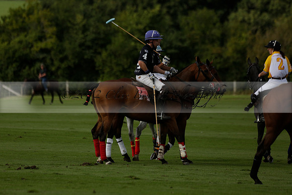 Aryana (black) v Shoreline (yellow) in a Farewell Cup polo match played on Ambersham 5 at Cowdray Park Polo Club on Wednesday 18 September 2013. www.polopictures.co.uk