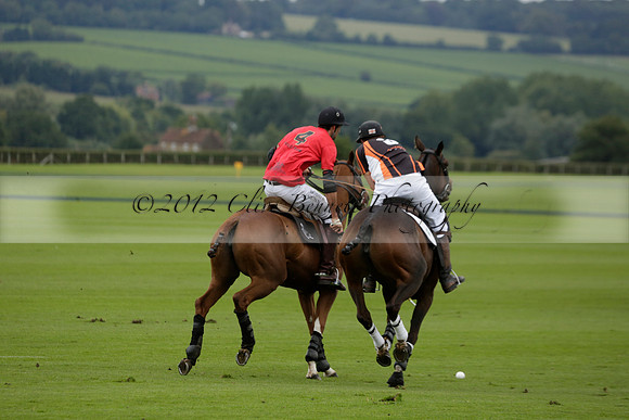 Four Quarters Black (black) v Clashleigh (red) in the Autumn Cup subsidiary final polo match on Ambersham 2 at Cowdray Park Polo Club on Sunday 22 September 2013 www.polopictures.co.uk