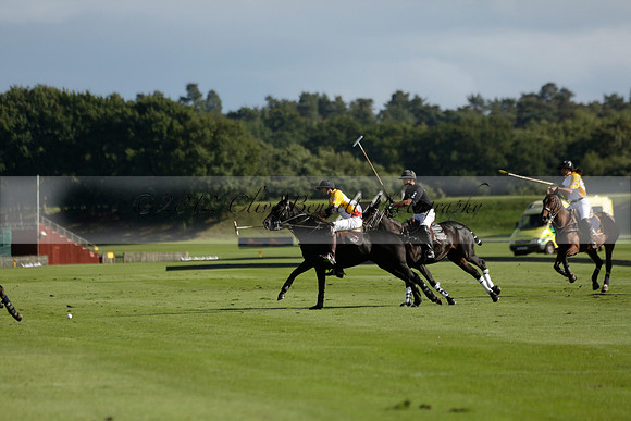 Aryana (black) v Shoreline (yellow) in a Farewell Cup polo match played on Ambersham 5 at Cowdray Park Polo Club on Wednesday 18 September 2013. www.polopictures.co.uk