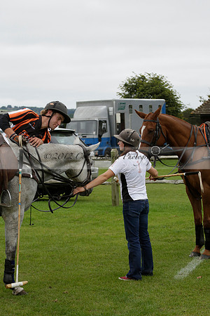 Four Quarters Black (black) v Clashleigh (red) in the Autumn Cup subsidiary final polo match on Ambersham 2 at Cowdray Park Polo Club on Sunday 22 September 2013 www.polopictures.co.uk