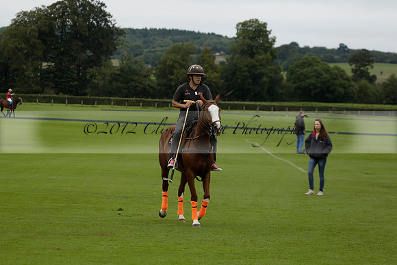 Four Quarters Black (black) v Clashleigh (red) in the Autumn Cup subsidiary final polo match on Ambersham 2 at Cowdray Park Polo Club on Sunday 22 September 2013 www.polopictures.co.uk