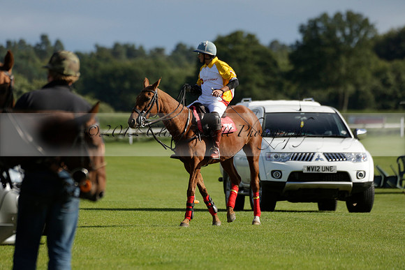 Aryana (black) v Shoreline (yellow) in a Farewell Cup polo match played on Ambersham 5 at Cowdray Park Polo Club on Wednesday 18 September 2013. www.polopictures.co.uk