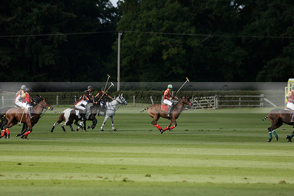 Four Quarters Black (black) v BHC (red) in a Autumn Cup polo match on Ambersham 2 at Cowdray Park Polo Club on Friday 20 September 2013 www.polopictures.co.uk