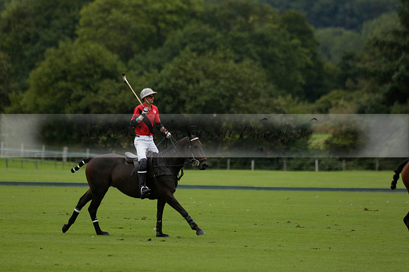 Four Quarters Black (black) v Clashleigh (red) in the Autumn Cup subsidiary final polo match on Ambersham 2 at Cowdray Park Polo Club on Sunday 22 September 2013 www.polopictures.co.uk