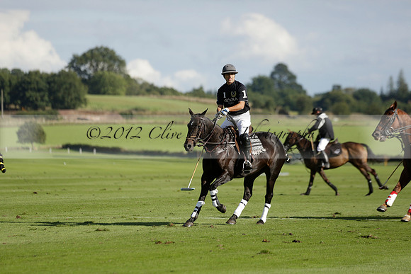 Aryana (black) v Shoreline (yellow) in a Farewell Cup polo match played on Ambersham 5 at Cowdray Park Polo Club on Wednesday 18 September 2013. www.polopictures.co.uk