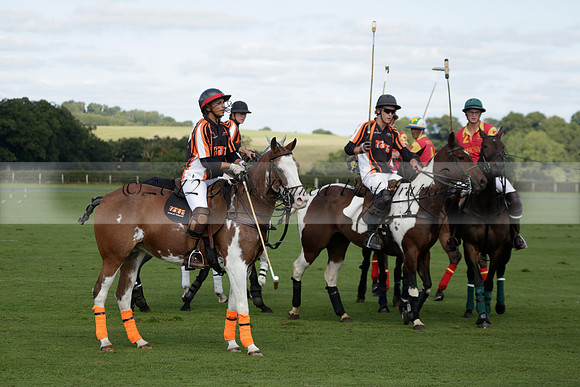 Four Quarters Black (black) v BHC (red) in a Autumn Cup polo match on Ambersham 2 at Cowdray Park Polo Club on Friday 20 September 2013 www.polopictures.co.uk