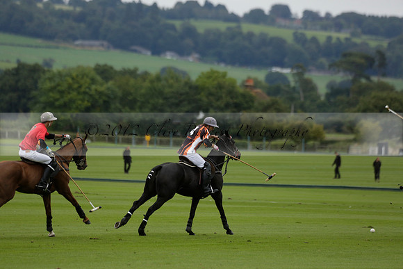 Four Quarters Black (black) v Clashleigh (red) in the Autumn Cup subsidiary final polo match on Ambersham 2 at Cowdray Park Polo Club on Sunday 22 September 2013 www.polopictures.co.uk