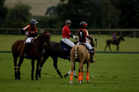 Four Quarters Black (black) v Clashleigh (red)in a Jaeger Le Coultre Autumn Cup polo match played on Ambersham 2 at Cowdray Park Polo Club on Wednesday 2013.09.11 www.polopictures.co.uk