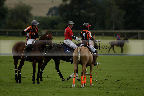 Four Quarters Black (black) v Clashleigh (red)in a Jaeger Le Coultre Autumn Cup polo match played on Ambersham 2 at Cowdray Park Polo Club on Wednesday 2013.09.11 www.polopictures.co.uk