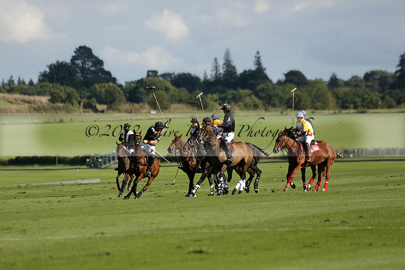 Aryana (black) v Shoreline (yellow) in a Farewell Cup polo match played on Ambersham 5 at Cowdray Park Polo Club on Wednesday 18 September 2013. www.polopictures.co.uk