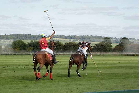 Four Quarters Black (black) v BHC (red) in a Autumn Cup polo match on Ambersham 2 at Cowdray Park Polo Club on Friday 20 September 2013 www.polopictures.co.uk