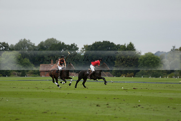 Four Quarters Black (black) v Clashleigh (red) in the Autumn Cup subsidiary final polo match on Ambersham 2 at Cowdray Park Polo Club on Sunday 22 September 2013 www.polopictures.co.uk