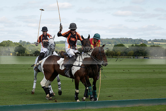 Four Quarters Black (black) v BHC (red) in a Autumn Cup polo match on Ambersham 2 at Cowdray Park Polo Club on Friday 20 September 2013 www.polopictures.co.uk