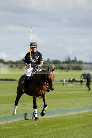 Aryana (black) v Shoreline (yellow) in a Farewell Cup polo match played on Ambersham 5 at Cowdray Park Polo Club on Wednesday 18 September 2013. www.polopictures.co.uk