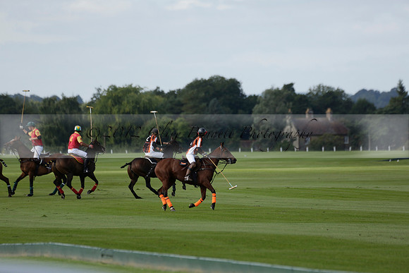 Four Quarters Black (black) v BHC (red) in a Autumn Cup polo match on Ambersham 2 at Cowdray Park Polo Club on Friday 20 September 2013 www.polopictures.co.uk