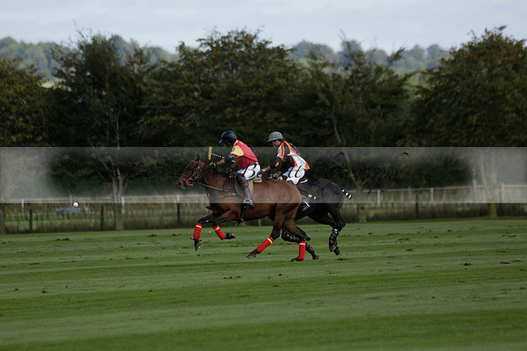 Four Quarters Black (black) v BHC (red) in a Autumn Cup polo match on Ambersham 2 at Cowdray Park Polo Club on Friday 20 September 2013 www.polopictures.co.uk
