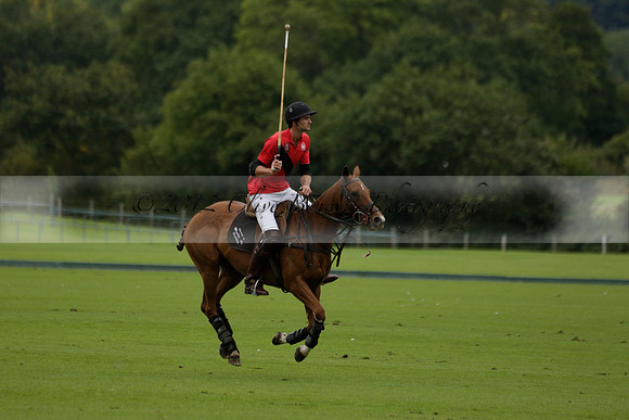 Four Quarters Black (black) v Clashleigh (red) in the Autumn Cup subsidiary final polo match on Ambersham 2 at Cowdray Park Polo Club on Sunday 22 September 2013 www.polopictures.co.uk