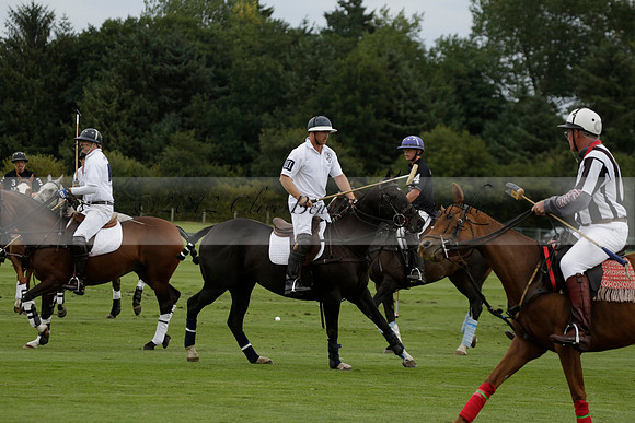 Aryana (black) v Home Farm (white) in a Farewell Cup polo match played on Ambersham 5 at Cowdray Park Polo Club on Wednesday 2013.09.11 www.polopictures.co.uk