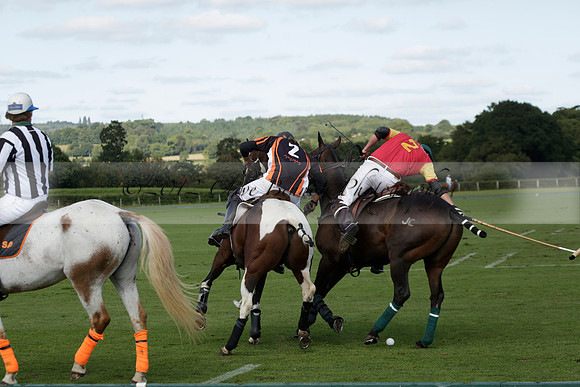 Four Quarters Black (black) v BHC (red) in a Autumn Cup polo match on Ambersham 2 at Cowdray Park Polo Club on Friday 20 September 2013 www.polopictures.co.uk