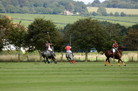 Four Quarters Black (black) v BHC (red) in a Autumn Cup polo match on Ambersham 2 at Cowdray Park Polo Club on Friday 20 September 2013 www.polopictures.co.uk
