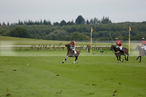 Four Quarters Black (black) v Clashleigh (red) in the Autumn Cup subsidiary final polo match on Ambersham 2 at Cowdray Park Polo Club on Sunday 22 September 2013 www.polopictures.co.uk