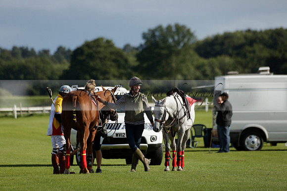 Aryana (black) v Shoreline (yellow) in a Farewell Cup polo match played on Ambersham 5 at Cowdray Park Polo Club on Wednesday 18 September 2013. www.polopictures.co.uk