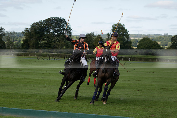 Four Quarters Black (black) v BHC (red) in a Autumn Cup polo match on Ambersham 2 at Cowdray Park Polo Club on Friday 20 September 2013 www.polopictures.co.uk