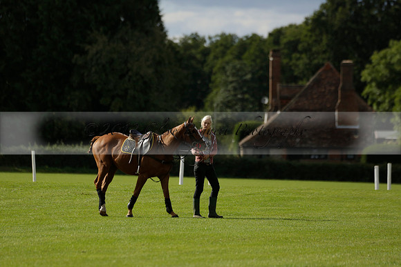 Aryana (black) v Shoreline (yellow) in a Farewell Cup polo match played on Ambersham 5 at Cowdray Park Polo Club on Wednesday 18 September 2013. www.polopictures.co.uk