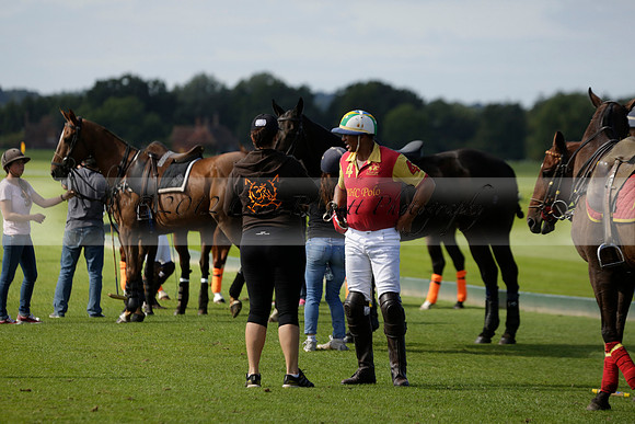 Four Quarters Black (black) v BHC (red) in a Autumn Cup polo match on Ambersham 2 at Cowdray Park Polo Club on Friday 20 September 2013 www.polopictures.co.uk