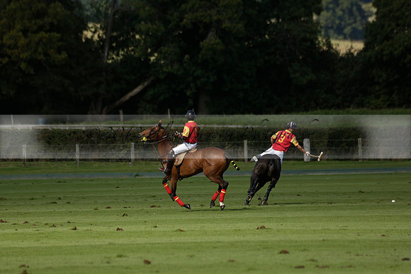 Four Quarters Black (black) v BHC (red) in a Autumn Cup polo match on Ambersham 2 at Cowdray Park Polo Club on Friday 20 September 2013 www.polopictures.co.uk