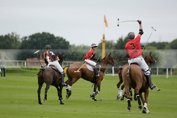 Four Quarters Black (black) v Clashleigh (red) in the Autumn Cup subsidiary final polo match on Ambersham 2 at Cowdray Park Polo Club on Sunday 22 September 2013 www.polopictures.co.uk