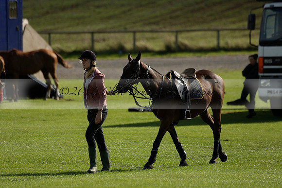Aryana (black) v Shoreline (yellow) in a Farewell Cup polo match played on Ambersham 5 at Cowdray Park Polo Club on Wednesday 18 September 2013. www.polopictures.co.uk