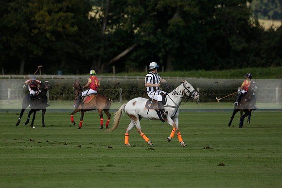 Four Quarters Black (black) v BHC (red) in a Autumn Cup polo match on Ambersham 2 at Cowdray Park Polo Club on Friday 20 September 2013 www.polopictures.co.uk