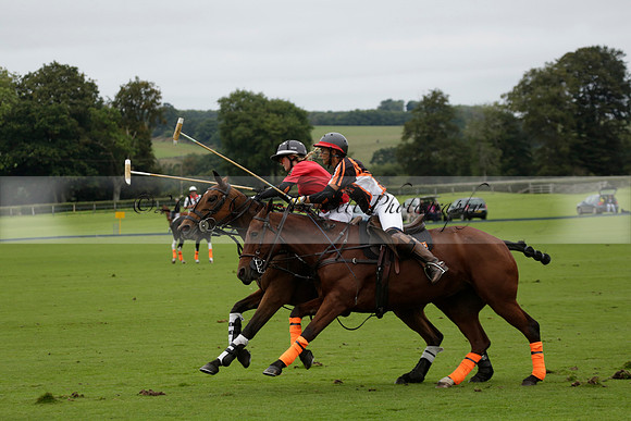 Four Quarters Black (black) v Clashleigh (red) in the Autumn Cup subsidiary final polo match on Ambersham 2 at Cowdray Park Polo Club on Sunday 22 September 2013 www.polopictures.co.uk