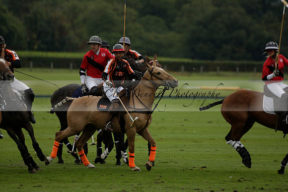 Four Quarters Black (black) v Clashleigh (red)in a Jaeger Le Coultre Autumn Cup polo match played on Ambersham 2 at Cowdray Park Polo Club on Wednesday 2013.09.11 www.polopictures.co.uk